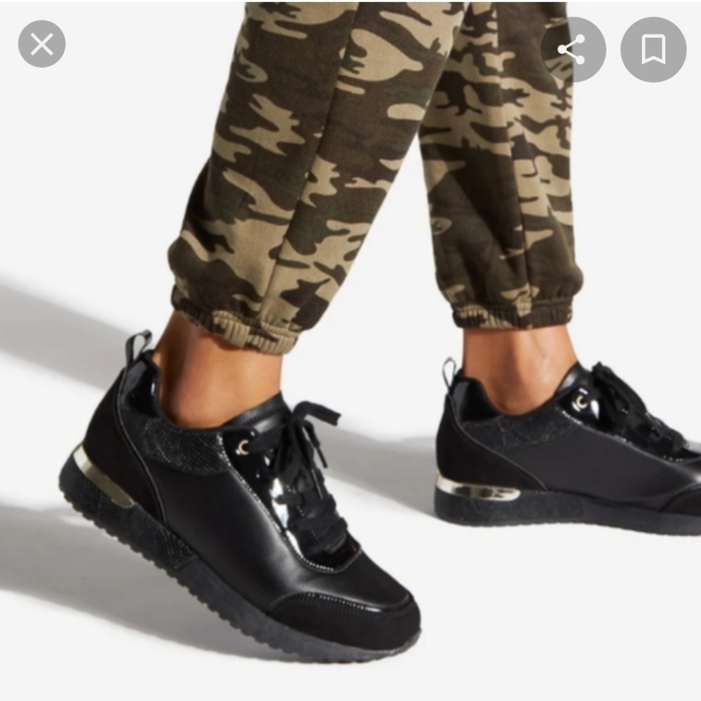 Black Sneaker BNIB, size 9, gold metal in back. Very cute!